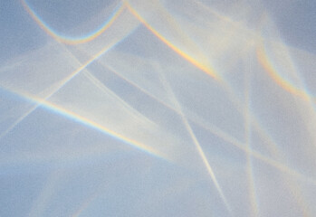 Abstract blue background with soft pastel light trails and a subtle grain texture, conveying ethereal motion and digital ambience for creative, modern visuals