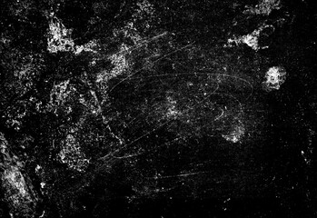 Dark grunge texture with scratched black surface and scattered white dust particles, moody atmospheric backdrop for design projects, overlays, and edgy visual compositions