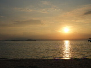 Evening sun set with shade of evening orange sun light and clouded sky background