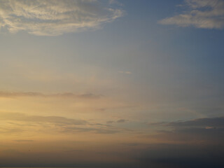 Evening sun set with shade of evening orange sun light and clouded sky background