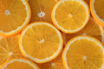 a background of Vibrant and Fresh Orange Slices Arranged Close-Up