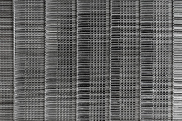 Background and texture of iron nails for a pneumatic nail gun, closeup, top view. Abstract surface of carpenters nails