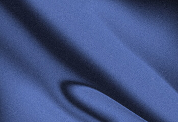 Obraz premium Abstract close-up of a blue fabric texture featuring folds, grainy surface, and smooth curves, highlighting depth, shading, and subtle shadows for modern design and backgrounds