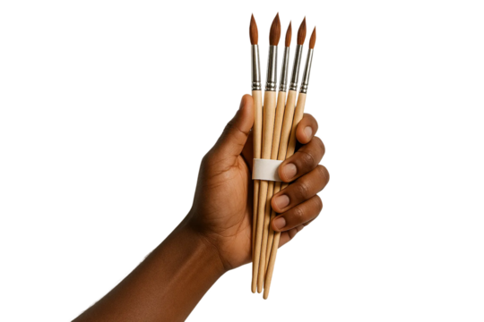 Dark-skin tone hand holding set of paint brushes — PNG transparent