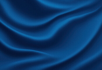 Close-up of smooth blue satin fabric with flowing folds and soft highlights, capturing luxurious texture and rich color for elegant fashion, textile, or interior design imagery
