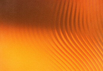 Macro close up of warm orange abstract texture with a smooth gradient and flowing curved lines, creating a dynamic background ideal for design, advertising and art projects