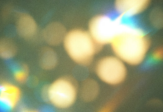 Abstract close up of colorful bokeh lights in soft focus, creating a dreamy, festive atmosphere with shimmering golds, greens and blues, evoking celebration and magical ambience
