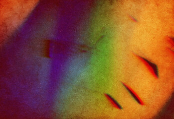 Abstract multicolor texture with a grainy, noise-heavy background showing spectrum of warm and cool tones blending together into a dynamic artistic backdrop for design and layouts