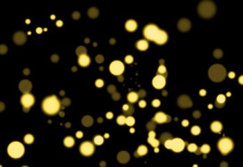 Abstract golden bokeh light particles floating on a dark background create a festive, dreamy atmosphere ideal for luxury branding, events, celebration themes, and ambient design