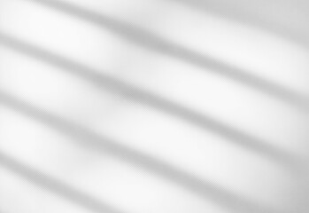 Obraz premium Abstract grayscale image with soft diagonal shadow stripes across a smooth surface, capturing moody light textures, subtle gradients, and tranquil atmosphere for design projects