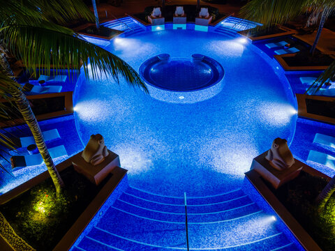Illuminated Pool at Night in Solidaridad, MX