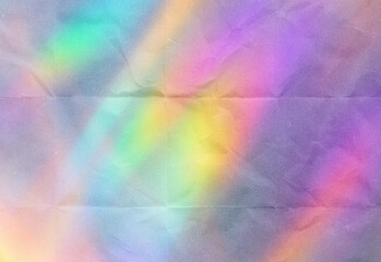 Soft rainbow spectrum over a textured abstract background with pastel hues and dreamy glow, perfect for design projects, backgrounds, banners, and creative layouts