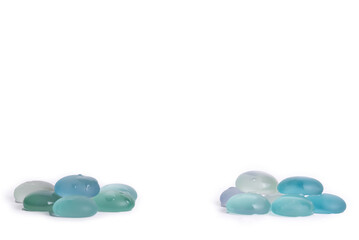 Minimal wellness scene with wet blue stones and empty space for product or text.