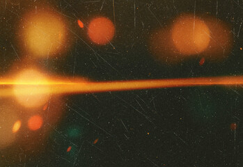 Abstract cosmic light scene featuring a warm orange lens flare across a grainy dark background with scattered bokeh and speckled texture, cinematic and futuristic vibe.