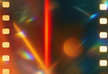 Abstract film frame with vibrant light leaks, rainbow bokeh and grainy vintage texture creating a cinematic, nostalgic background for design, advertising, and creative projects