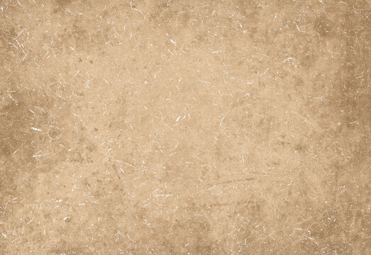 High resolution brown textured paper background with subtle grain and warm neutral tones featuring weathered edge, a versatile backdrop for graphic design, invitations and branding