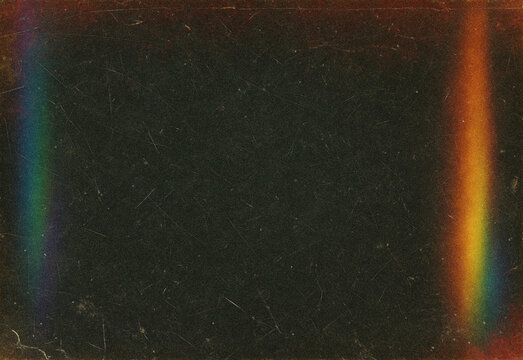 Grainy vintage film texture with a dark starry background and subtle rainbow light leaks along the edges, creating a nostalgic retro cinematic mood and moody atmosphere