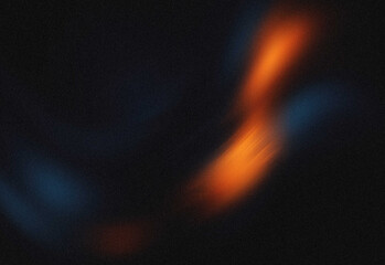 Abstract long exposure light trails in a dark night scene featuring warm orange and cool blue streaks suggesting motion, energy, technology, and dynamic visual storytelling