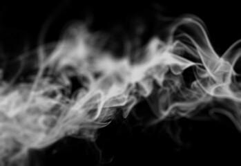 Ethereal white smoke swirls across a deep black background, creating a moody, abstract atmosphere ideal for design projects, branding concepts, and cinematic imagery
