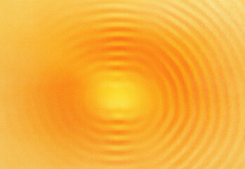 Close-up abstract orange gradient with concentric ripple patterns and a luminous center, creating a warm sunburst texture ideal for backgrounds, design projects and branding