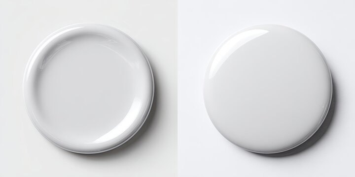 Two white, glossy circular objects one concave, one convex on a white surface