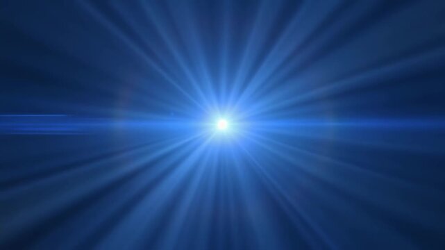 Bright blue light rays emanating from a central point creating a radiant star burst effect on a dark background