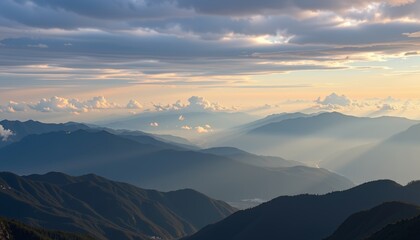 Layered mountain ridges fade into dusk scenic landscape nature peaceful viewpoint majestic serenity