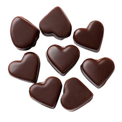 Heart-shaped chocolate pieces arranged together to form a large heart on a black background. Symbol of love, romance, and Valentine&rsquo;s Day.