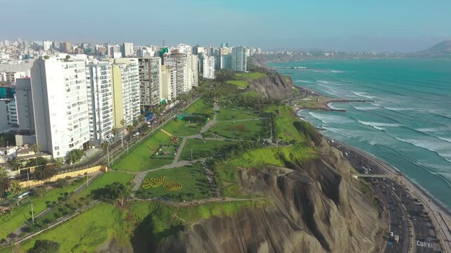 Aerial shot of lima modern cityscape featuring the Maria Reiche park overlooking the pacific ocean
