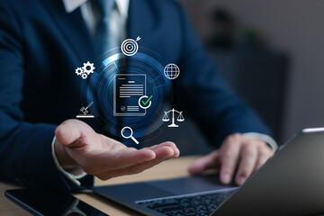 Businessman presenting a floating digital document with legal and compliance icons. Concept of online contract approval, legaltech, corporate governance, data validation and digital law technology