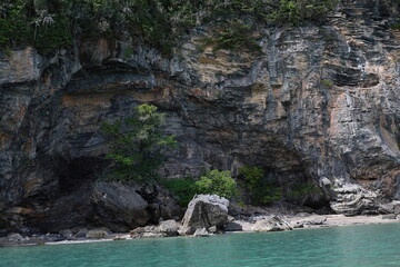 Pancake Rock Thailand is a wonder of tourist attraction that is ranked number 1 in 25 “Unseen New Chapters. Pancake Rock is series of layered stone slabs (Sedimentary Process). Khanom Sea in Thailand.