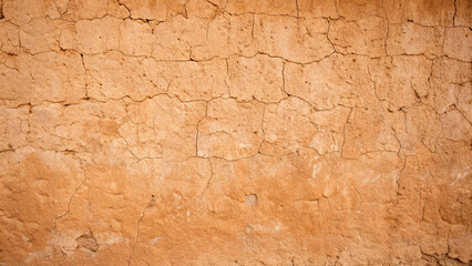 Obraz premium Cracked Earth Texture Background with Natural Clay Wall image photo