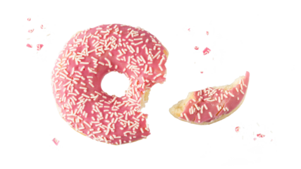 Pink glazed single bitten donut with white sprinkles and crumbs flying isolated on white