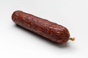 Delicious Smoked Sausage: Cured Meat Log on White Background for Culinary Concepts