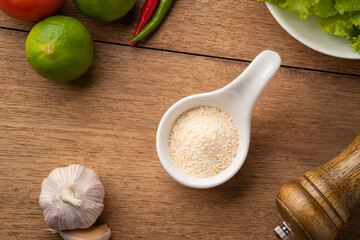 Ground roasted rice,brown rice powder (khaokua) in white bowl .Top view