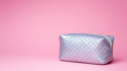 Cosmetic bag placed elegantly against a pink background, product showcase, clean and simple composition. lifestyle magazines.