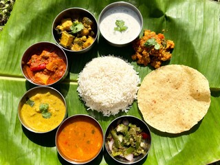 Traditional South Indian Vegetarian Thali Meal Served on a Banana Leaf