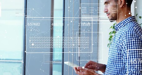 Male analyst tapping tablet by glass, generating business AR charts shifting for analysis