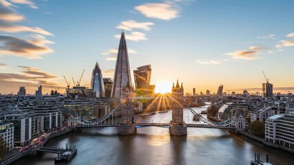 A majestic city skyline with a serene river and tranquil atmosphere captured in stunning 4K UHD aerial footage of dawn breaking, symbolizing new beginnings and fresh opportunities.