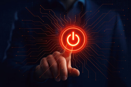Hand finger touching a bright red power button with digital circuit lines