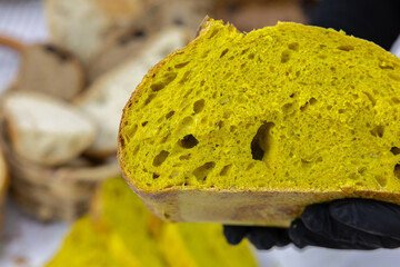 Fresh bread from the oven at a small artisan bakery at home. Very healthy sourdough bread products of various types. 