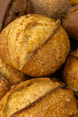 Fresh bread from the oven at a small artisan bakery at home. Very healthy sourdough bread products of various types. 