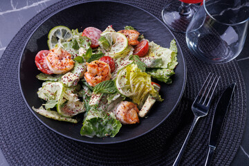 Gourmet Shrimp And Citrus Salad On Black Plate