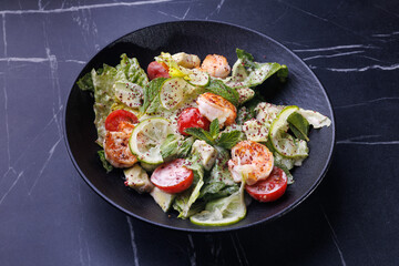 Gourmet Shrimp And Citrus Salad On Black Plate