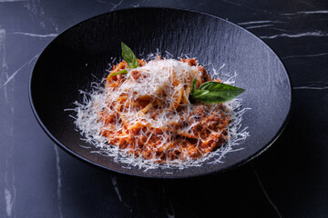 Pasta con Salsa di Pomodori - Pasta with Tomato Sauce: Classic pasta in a rich tomato sauce, seasoned with basil and garlic