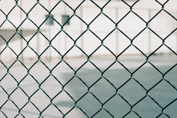 Fototapeta premium Chain link fence. Copy space. Close up.