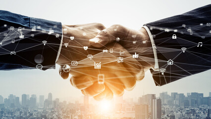Professional handshake seals digital deal amidst futuristic city skyline network, symbolizing connection and global business growth.