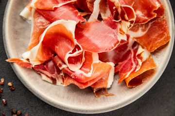 jamon serrano meat appetizer jamon iberico natural product tasty snack fresh delicious gourmet food background on the table rustic top view copy space