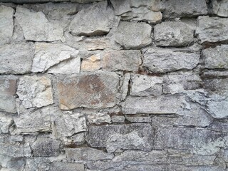 Background of very old stone wall texture photo