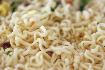 Noodles with spicy sauce and green onion chopped parts
